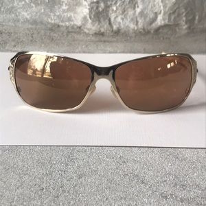 Oakley Behave gold women’s sunglasses